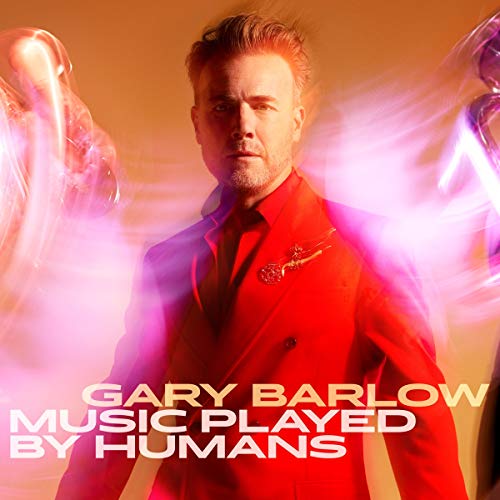 Gary Barlow in a red suit, album cover “Music Played By Humans.”