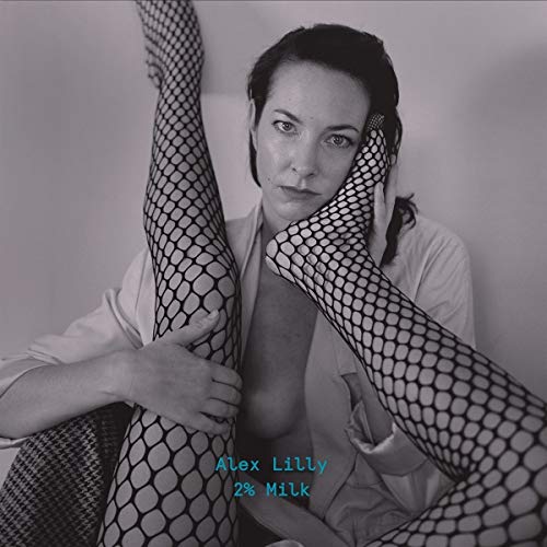 Black and white album cover featuring a woman with fishnet stockings.