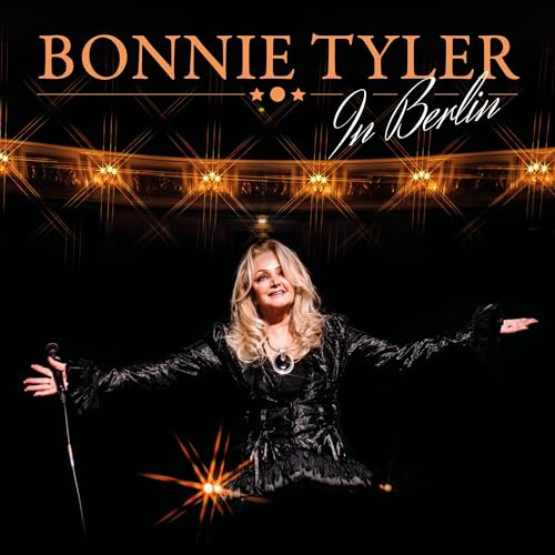 Bonnie Tyler album cover, singer in concert hall with lights.