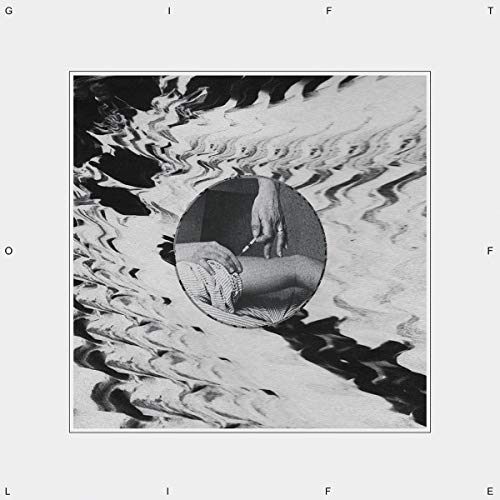 Black and white album cover with a distorted, circular image of a person.