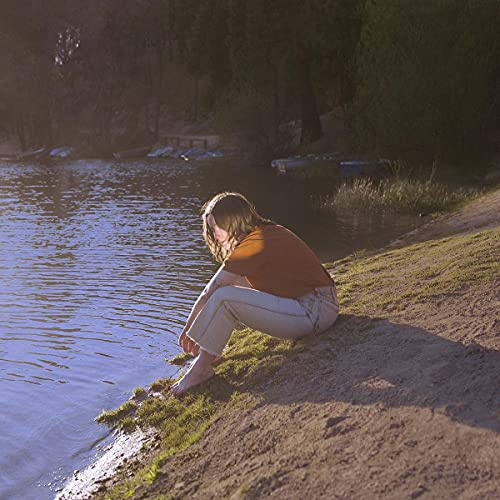 Person sitting barefoot by a lake, album cover for "Wayfinder.