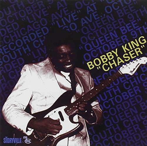 Bobby King playing a white electric guitar, album cover with text background.