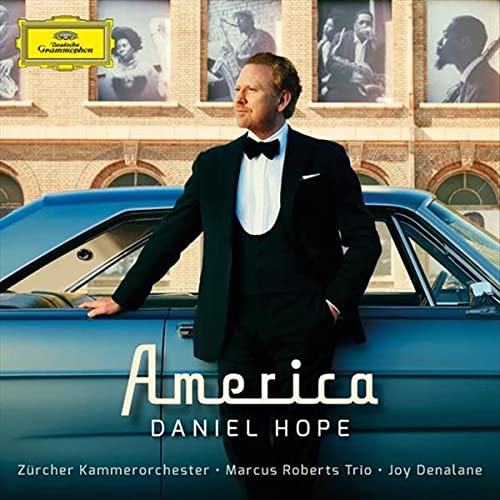 CD cover: Hope Daniel in a suit, leaning on a blue classic car.