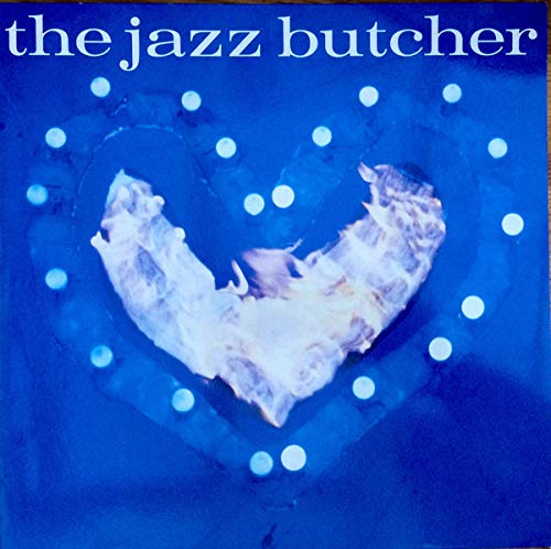 Blue album cover with a heart-shaped image of raw meat and circles.