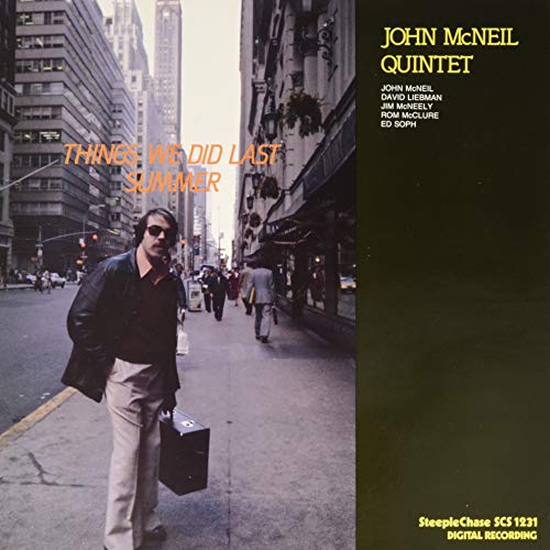 Vinyl record cover: man with suitcase on a city street.
