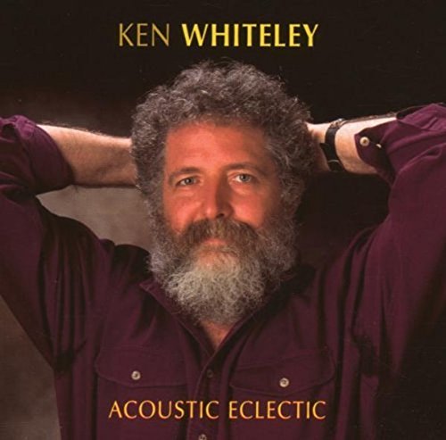 CD cover: portrait of bearded musician Ken Whiteley, hands behind head.