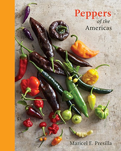 Cookbook cover featuring a colorful variety of chili peppers.