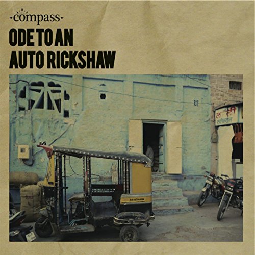 CD cover featuring a black and yellow auto rickshaw in India.