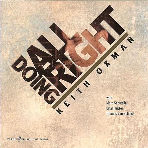 CD cover: Keith Oxman portrait with bold, angled text and musician credits.