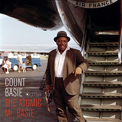 Count Basie album cover featuring a man in a suit by an airplane.