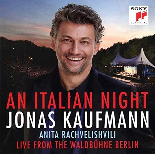 Jonas Kaufmann portrait on CD cover, with concert stage background.