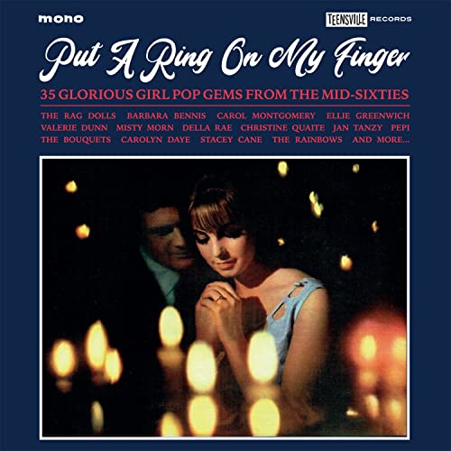 CD cover: couple in evening wear, lit by candles, with title text.