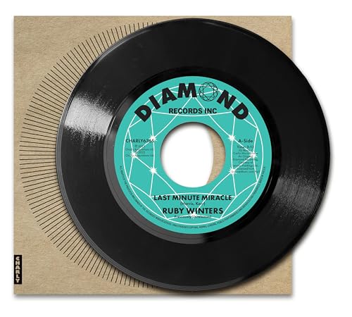 Black vinyl record with a teal label, reading “Ruby Winters - Last Minute Miracle”.