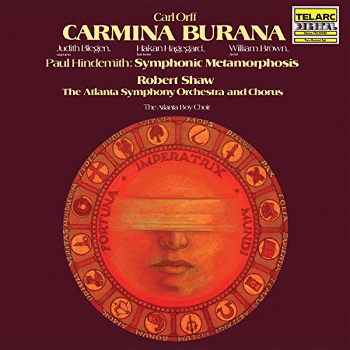 Red album cover for Orff’s Carmina Burana, featuring a sun-like face.