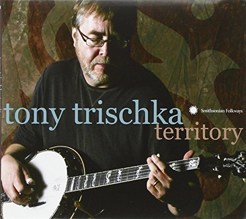 Tony Trischka holding a banjo on the album cover “Territory.”