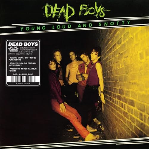 Dead Boys album cover: yellow brick wall with band photo and green text.