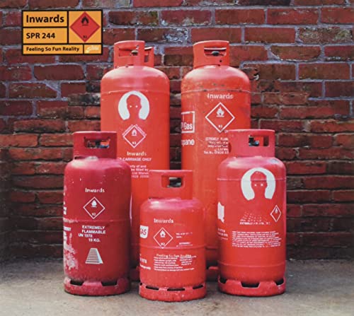 CD cover: red gas cylinders stacked against a brick wall.