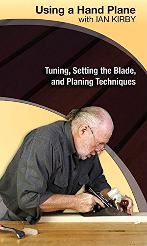 Ian Kirby using a hand plane on wood, DVD cover.