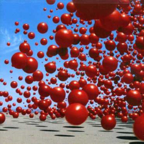 CD cover with numerous red spheres against a blue sky.