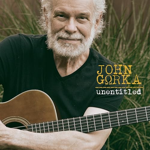 John Gorka album cover featuring a portrait of the musician with a guitar.