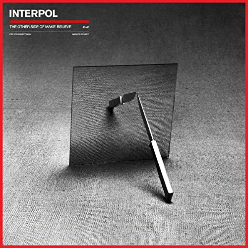 Interpol album cover: abstract metal sculpture on a textured gray background.
