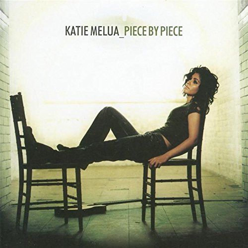Katie Melua album cover: woman reclining on mismatched chairs.