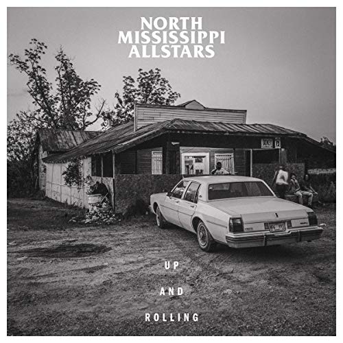 North Mississippi Allstars album cover: car, building, and people in grayscale.