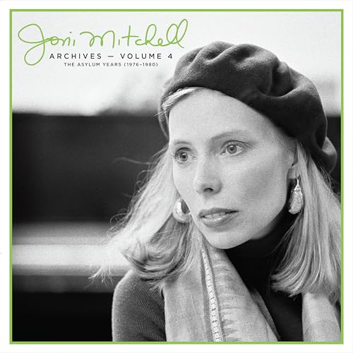 Black and white portrait of Joni Mitchell wearing a beret and earrings.