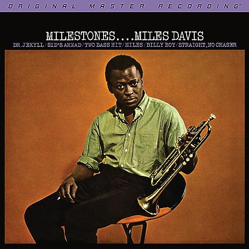 Miles Davis album cover, “Milestones,” featuring a portrait of Davis with trumpet.