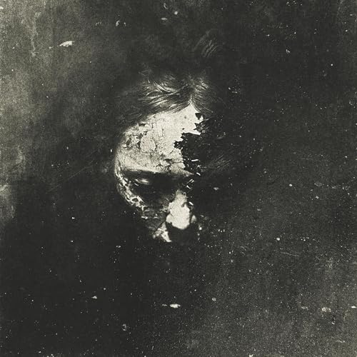 Dark, textured portrait of a face with obscured features, CD cover art.