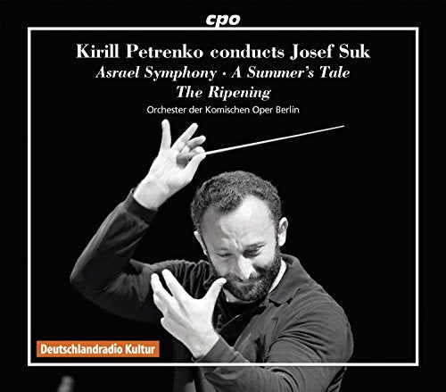 Black and white portrait of conductor Kirill Petrenko with baton raised.