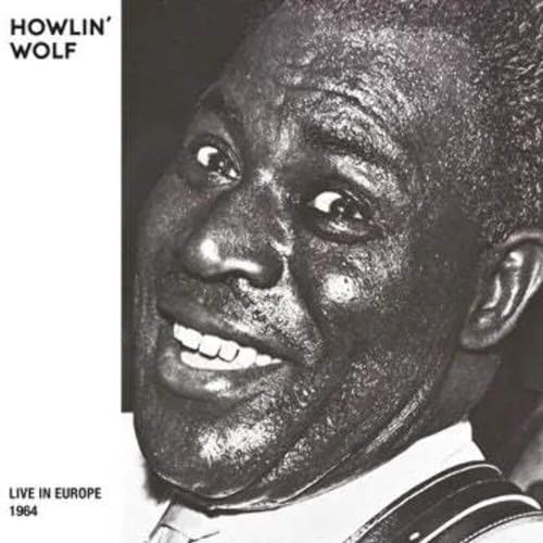 BlackClose-up black and white portrait of Howlin' Wolf smiling on a vinyl album cover.