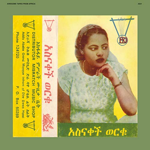 CD cover featuring a portrait of Asnakech Worku with Amharic text.