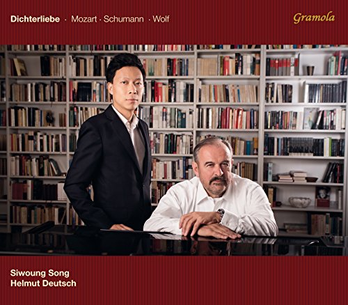 CD cover: two men in front of a large bookshelf.