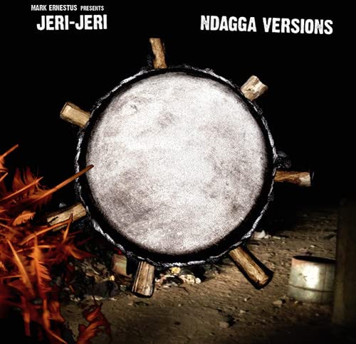 CD cover featuring a large, textured drum against a dark background.