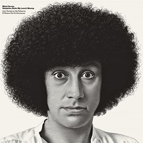 Black and white portrait of a man with a large afro, looking forward.