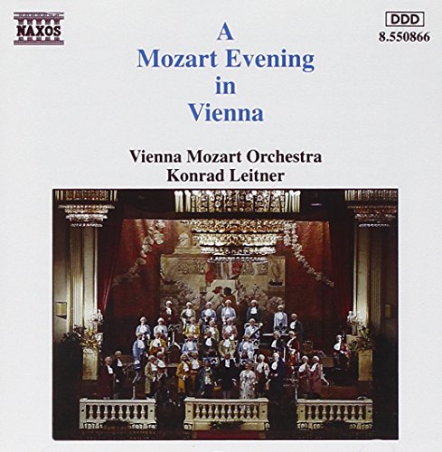 CD cover: orchestra performing on stage in a grand hall.