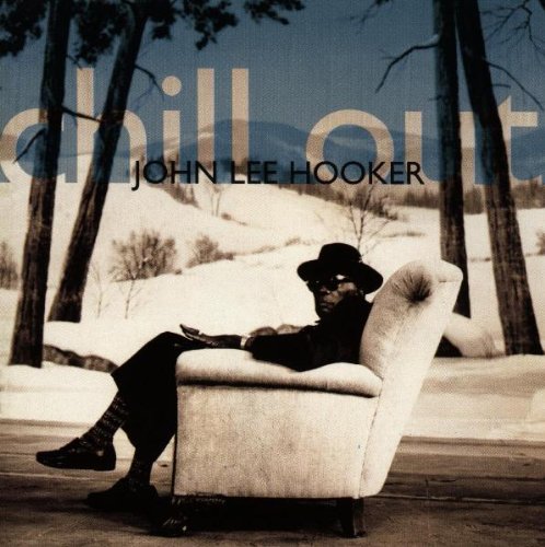 John Lee Hooker album cover: a man in a hat sits in a chair.
