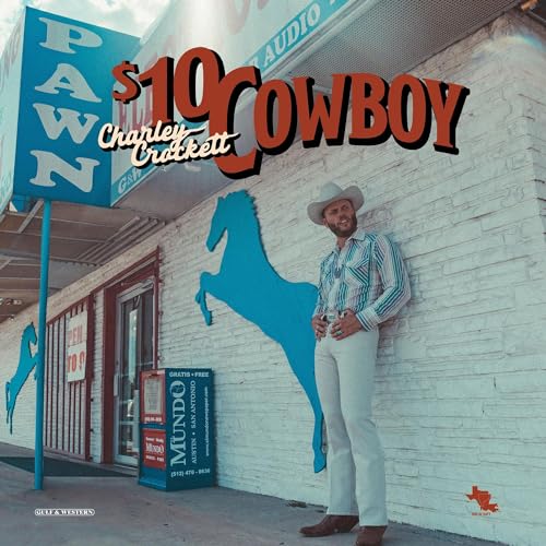 Charley Crockett album cover: cowboy leaning against a building facade.