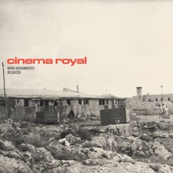 Black and white photo of a building with "cinema royal" text overlay.