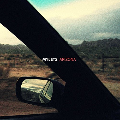 Mylets Arizona" vinyl cover: desert landscape seen through a car window.