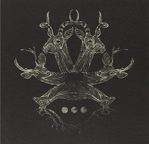 Black and gold symmetrical illustration of deer with antlers.