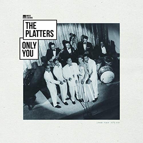 The Platters band in formal wear on a vintage album cover.