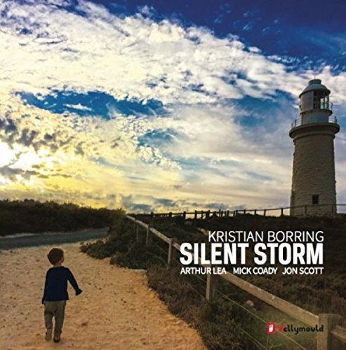 CD cover: lighthouse, boy walking on a path, cloudy sky.