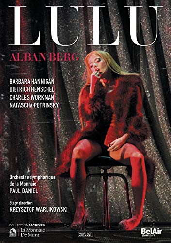 DVD cover featuring a woman in a fur coat sitting on a stool.