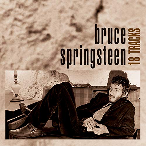Bruce Springsteen album cover: sepia-toned photo of a reclining man.