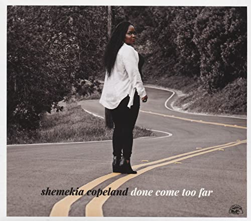 Shemekia Copeland album cover: woman on a winding road, muted tones.