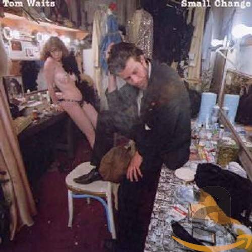 Tom Waits’ “Small Change” album cover: a dimly lit, cluttered dressing room scene.