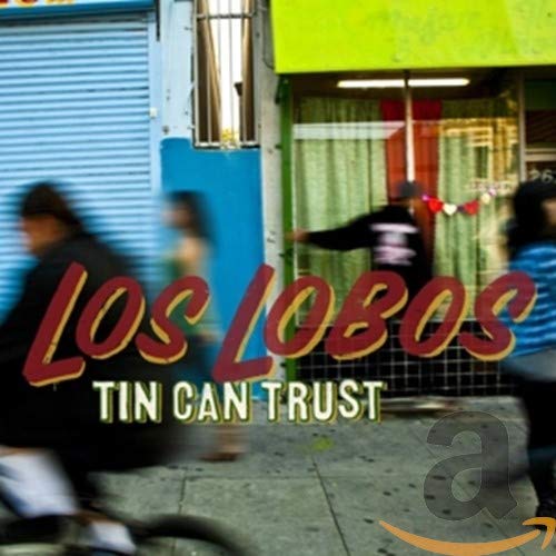 CD cover for Los Lobos' "Tin Can Trust" with blurred figures.