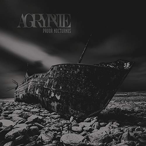 Agrypnie album cover: derelict ship on rocky shore, grayscale.